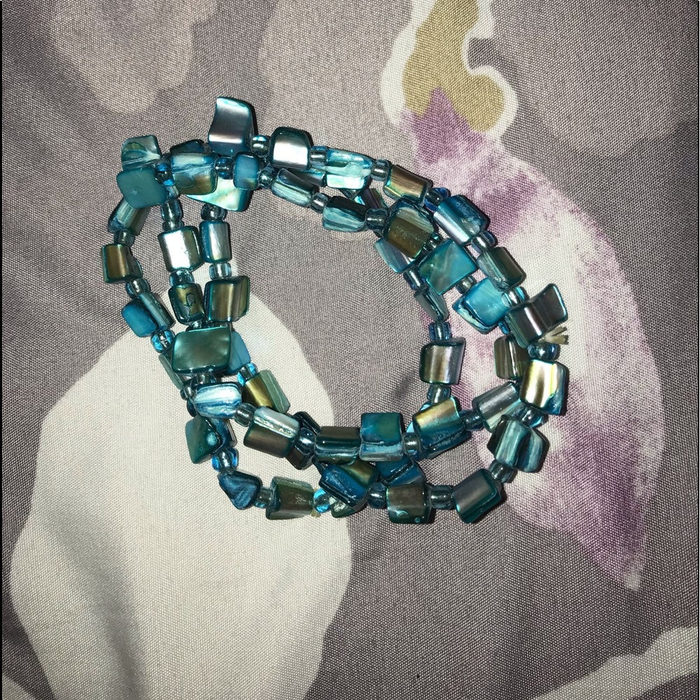 3 blue bracelets